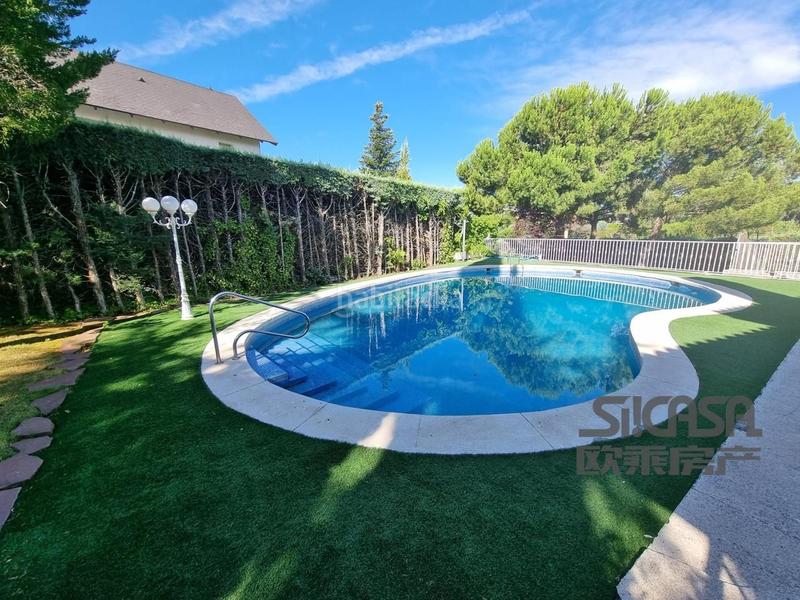 Foto b5e0c5a4-2d83-41ce-bf61-bf9fd7a0c781. Casa con riscaldamento parcheggio piscina in Los Robles Torrelodones