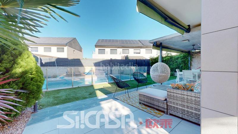 Foto 15ff88bb-3406-4e79-8d73-2756b8eb23ae. Casa aparellada amb calefacció aparcament piscina a Torrejón de la Calzada