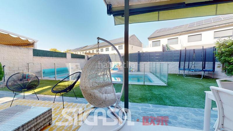 Foto f226c96f-a0ca-42f8-940f-55d64b21922d. Casa aparellada amb calefacció aparcament piscina a Torrejón de la Calzada