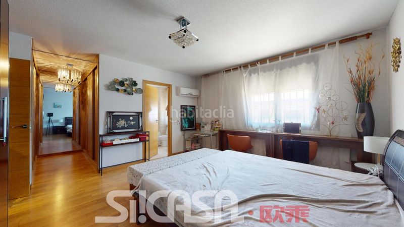 Foto a4ee7e8e-e036-496b-aeac-b7d21b2b56ae. Casa adossada amb calefacció piscina a Las Américas Parla