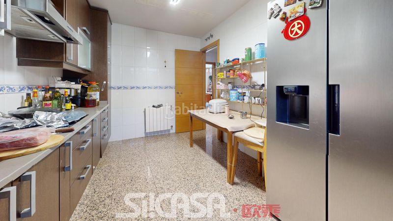 Foto acd6f849-30f3-4c37-8abf-ce0cd882195e. Casa adossada amb calefacció piscina a Las Américas Parla