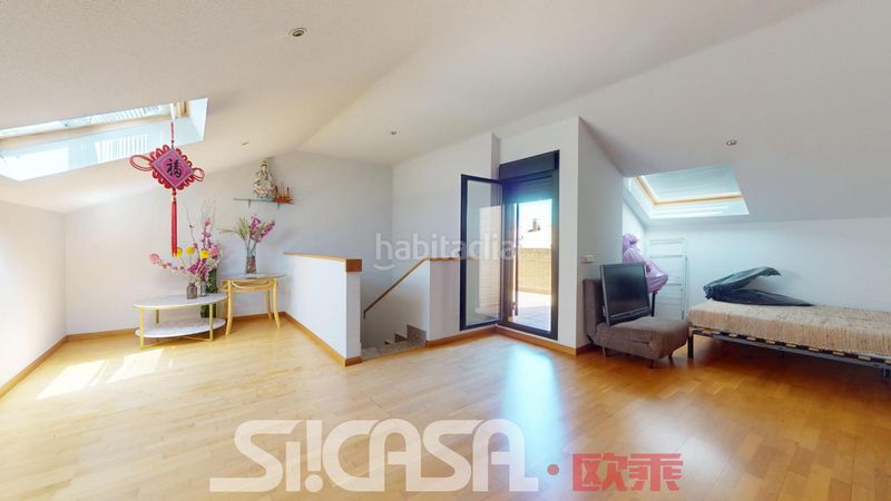 Foto b77c38aa-3ff9-46df-889d-2228ca3e282f. Casa adossada amb calefacció piscina a Las Américas Parla