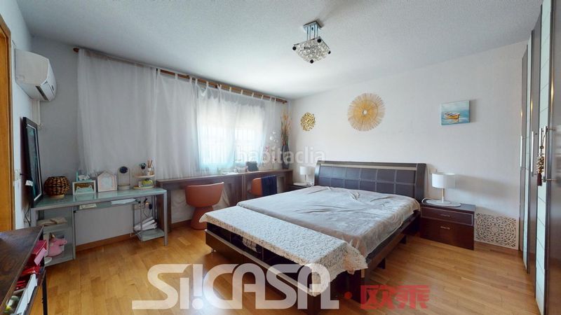 Foto c95128dc-8471-48f3-8320-2d1a23acef26. Casa adossada amb calefacció piscina a Las Américas Parla