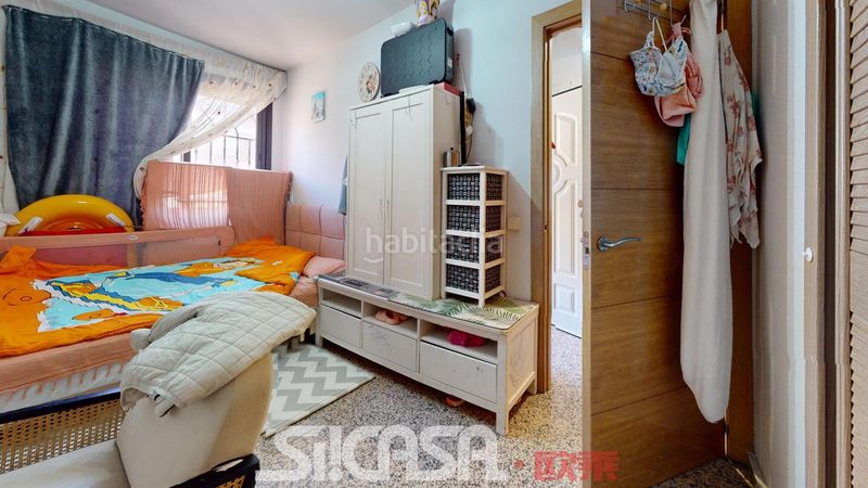 Foto f1b6311f-f933-48c8-b6b6-40f6130b9d0c. Casa adossada amb calefacció piscina a Las Américas Parla