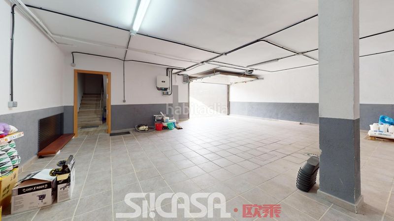 Foto 2b3442a7-23b7-4f25-a59d-12cce082fa52. Casa aparellada amb calefacció aparcament piscina a Parla