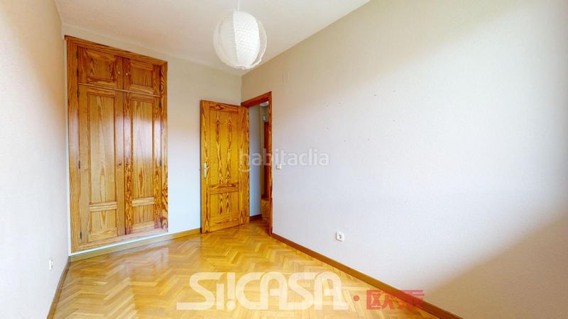 Foto 0e657bf0-9942-4c00-8934-5de1102de16c. Casa adossada amb calefacció aparcament a Las Américas Parla