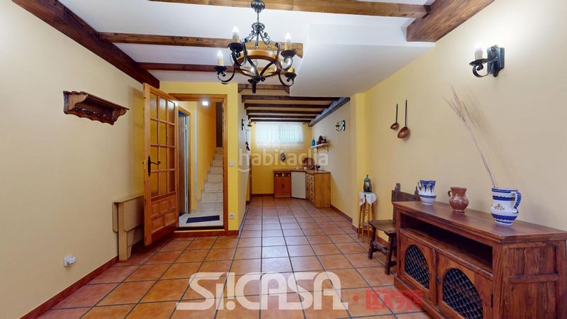 Foto bc66fcfe-a279-4da9-b58d-4414d8eab012. Casa adossada amb calefacció aparcament a Las Américas Parla