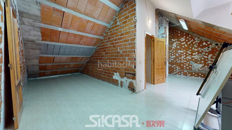 Foto bd8746ac-95ac-470f-bbff-5d019d4b0fb9. Casa adossada amb calefacció aparcament a Las Américas Parla