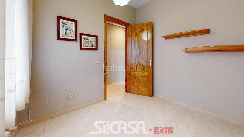 Foto e7b15011-6d21-45a4-8cf5-f7c33ee891db. Casa adossada amb calefacció aparcament a Las Américas Parla