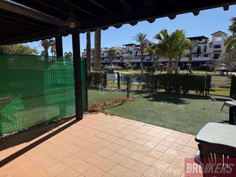 Foto b073fa3f-01c5-497f-bc0b-f7023c86067d. Piso playa apartamento en primera línea con jardín privado en Vera