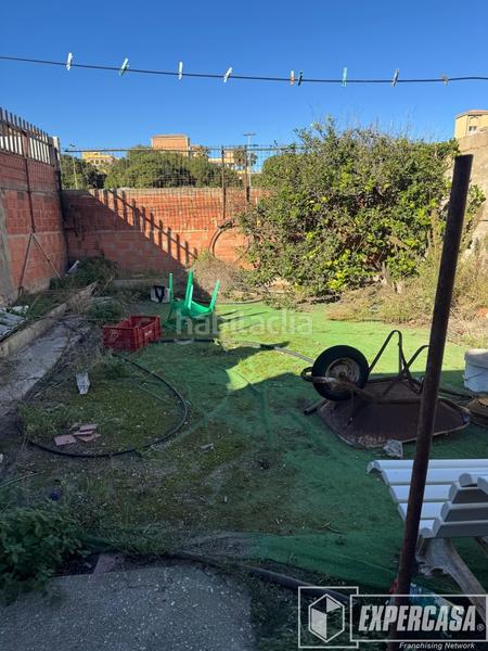Foto 01c664d0-a502-4abd-8a42-7acf819c9755. Casa adosada en Les Palmeres Sueca