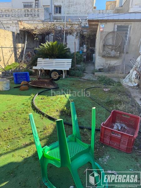 Foto f4c02917-e386-432d-994c-8fab2cc51f96. Casa adosada en Les Palmeres Sueca