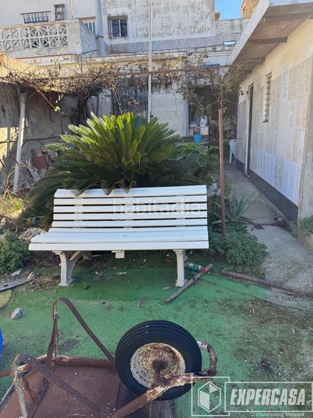 Foto a5228022-95ff-497b-b316-792fd63e485f. Reihenhaus in Les Palmeres Sueca