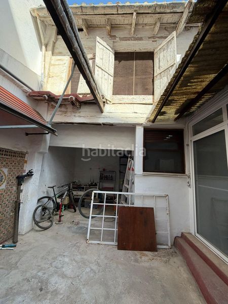 Foto cce9e7fd-1ce3-4fff-bba5-69d82d6306cf. Casa adossada a El Castell Burjassot