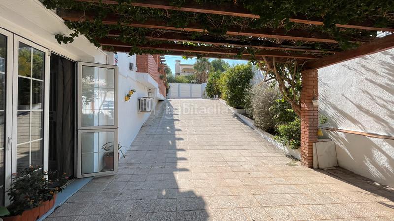 Foto d7f86969-fe9b-487f-bcbd-3fbb24614871. Semi detached house with fireplace heating parking pool in Coma-ruga