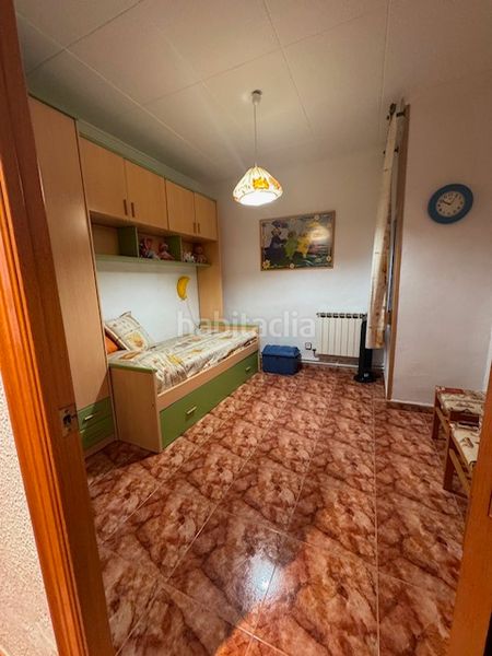 Foto f6878c4c-43fc-4e4d-b285-a9d1400a365c. Casa adossada amb calefacció a Casc Antic Ripollet