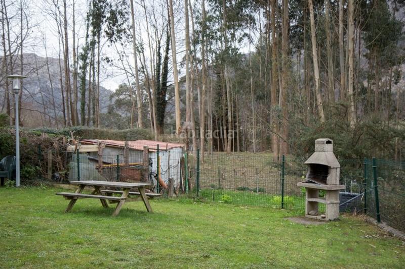 Foto a9f48b74-6fac-4a79-88fd-570587c46fe6. Piso ubicado a los pies de la famosa cueva de el soplao, este encantador bajo con terraza y acceso a jardín, en celis, valle del nansa, en Rionansa