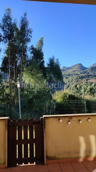 Foto f1566cda-d03e-4dde-be59-ba39de08fc7d. Piso ubicado a los pies de la famosa cueva de el soplao, este encantador bajo con terraza y acceso a jardín, en celis, valle del nansa, en Rionansa