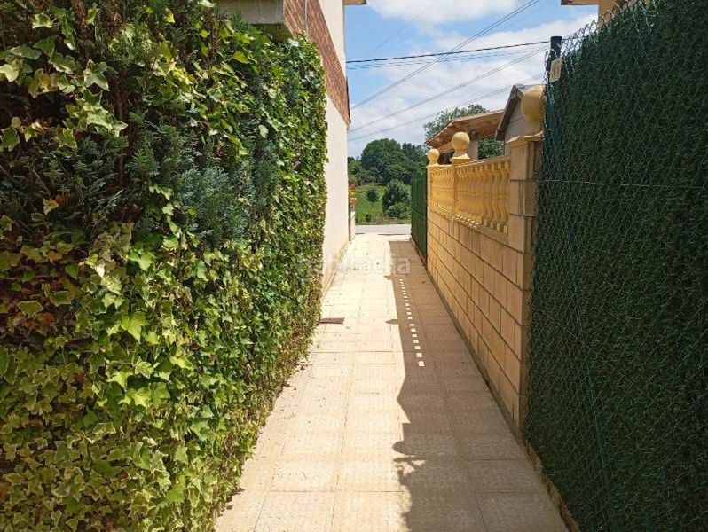 Foto 11ce5037-18a9-4fe7-a85c-3d1cf3271d4e. Casa adossada amb calefacció aparcament a Reocín