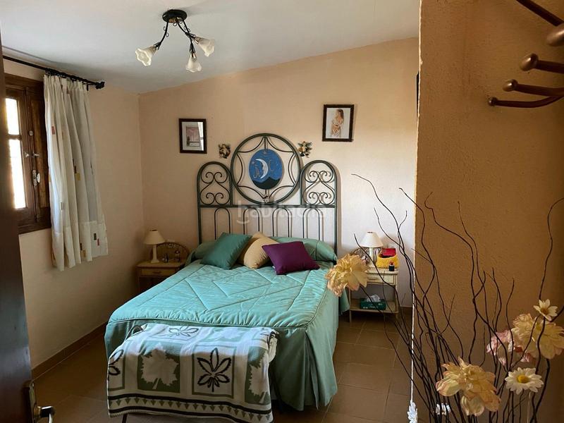 Foto f92ab63d-fb54-400d-8e08-5d0760c4e8e0. Finca rústica conjunto de 3 fincas en carretera en Alforja