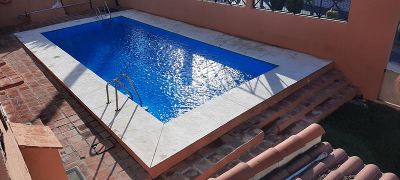 Foto 60892cd1-d793-40e3-b669-eb17c8ca7bbb. Location maison jumelée avec chauffage parking dans Torremolinos