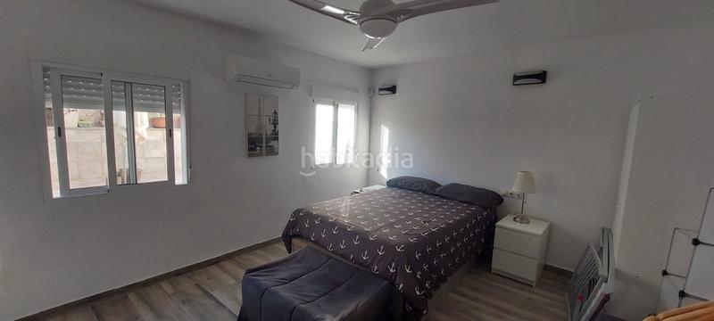 Foto 19ca12fa-1eae-4a62-8112-05f561beeb2a. Chalet avec parking dans El Bajondillo Torremolinos