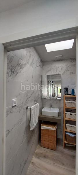 Foto ba6b493c-7d26-4ee7-afcf-b0ceeb4cec20. Chalet avec parking dans El Bajondillo Torremolinos