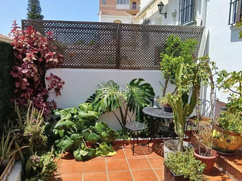 Foto 6c9bc804-5857-41d5-b6f5-b09788cf5bf7. Casa adossada amb calefacció piscina a El Pinillo Torremolinos