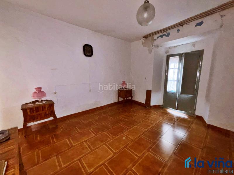 Foto cd1c0c58-aaab-4d01-83f0-64407cbf8e01. Casa aparellada a Archidona