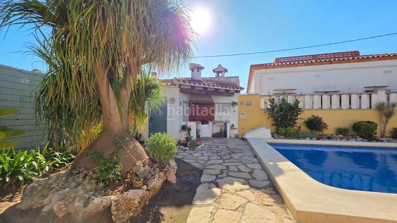 Foto 9bd9d6a9-d105-431e-ab0d-b81800e7c5b1. Chalet  en playa en Oliva playa Oliva