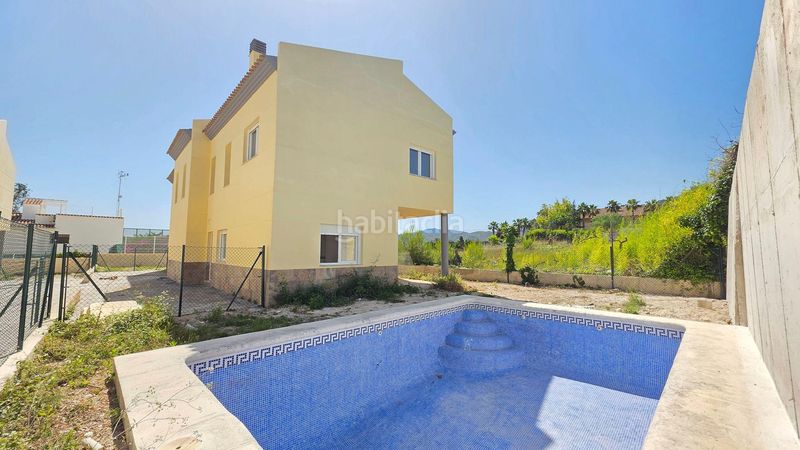 Foto afafb6d0-3ade-4b0b-a3de-53f3ea44880a. Casa adossada amb piscina a Benicolet