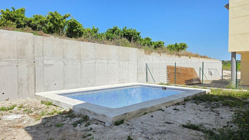 Foto ed5cb169-f8f9-409d-80e9-eecbdc00dd90. Casa adossada amb piscina a Benicolet