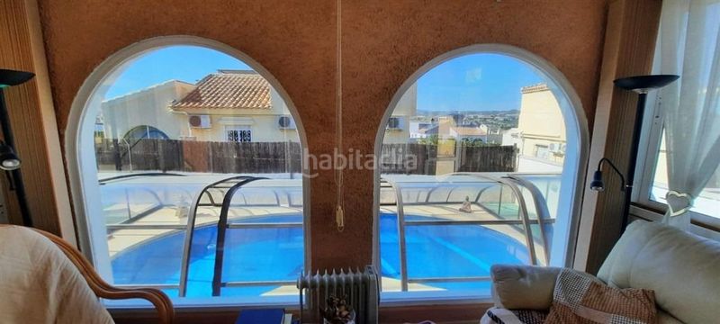 Foto 52bded8d-49f0-4735-a3e3-904b08dd43b1. Casa excepcional villa estilo rosa en la popular zona b con piscina cubierta y climatizada en Mazarrón