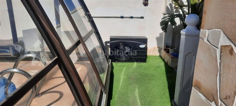 Foto d76fc4dd-fd61-45c2-938b-1ff4d499b53d. Casa excepcional villa estilo rosa en la popular zona b con piscina cubierta y climatizada en Mazarrón