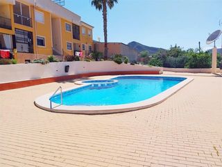 Apartament a Agrupación atalaya 6. Apartamento en planta baja con piscina y jardines comunitarios