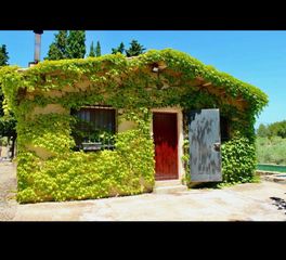 Fondo rustico in Botarell. Finca con casa en botarell