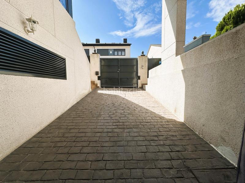 Foto 5d004f2d-8724-48ca-afa6-388866795ffa. Casa adossada amb calefacció aparcament piscina a Arganda del Rey