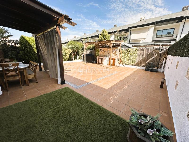 Foto f05bbcff-877f-40e8-bcc4-d4362bac24a3. Casa adossada amb calefacció aparcament piscina a Arganda del Rey