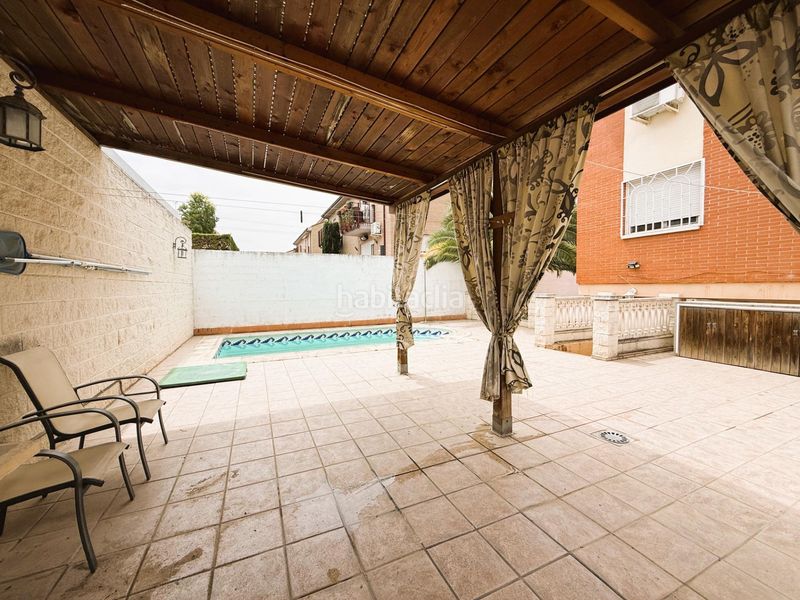 Foto 2a1554c3-2b0c-4b38-8bf1-607706930663. Casa aparellada amb calefacció aparcament piscina a Arganda del Rey