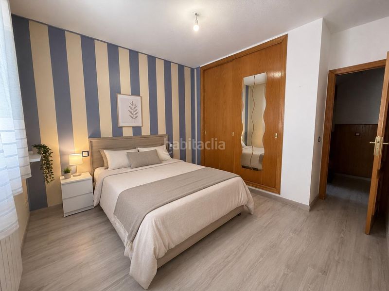Foto c05961d7-8595-47a1-9a24-1f575435b727. Casa aparellada amb calefacció aparcament piscina a Arganda del Rey