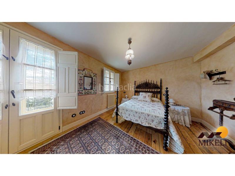 Foto ab8ab820-b296-4279-a314-7da6e4d55848. Chalet herencia indiana en Puente Viesgo