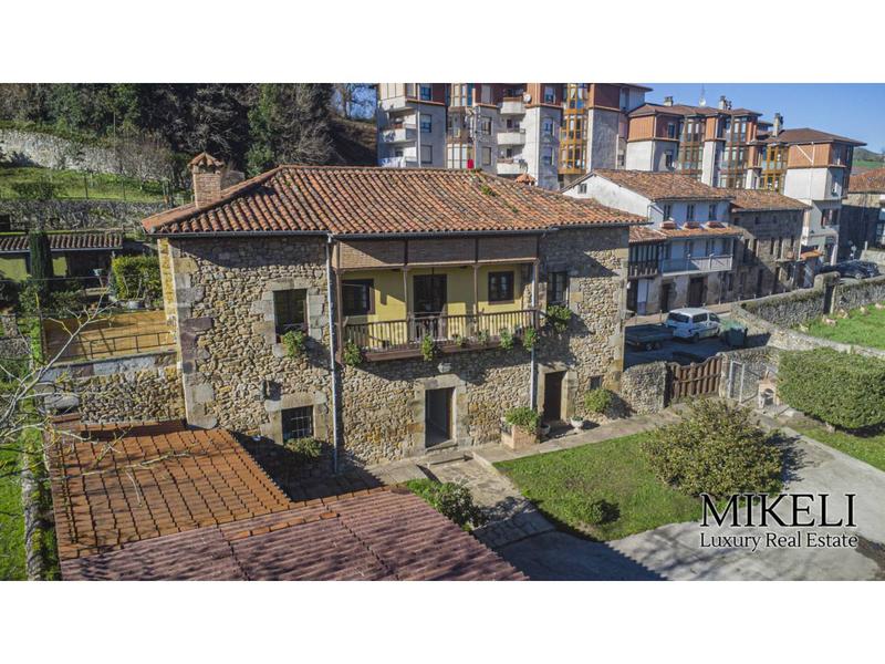 Foto 9850d853-d4cd-472c-9a86-8a73645bd482. Chalet  unifamiliar con jardín en venta en Liérganes