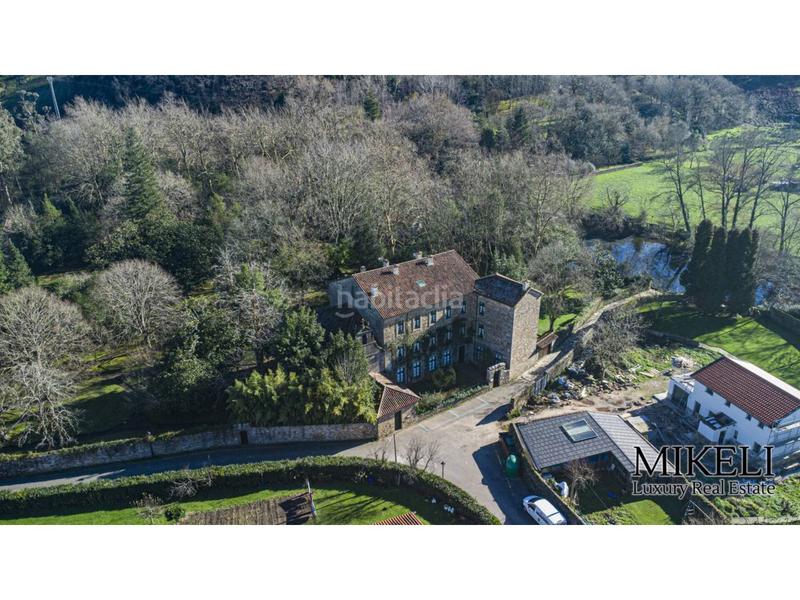 Foto d8411360-fef1-4fdc-8818-36ecd523f1e3. Chalet  unifamiliar con jardín en venta en Liérganes
