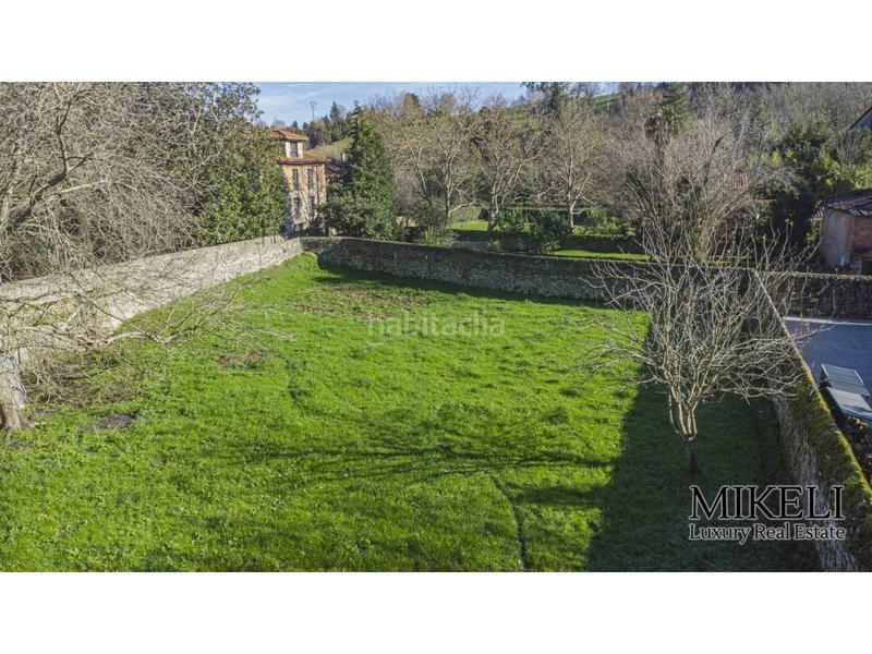 Foto 9d2f4aa7-3f56-43d3-832a-06550dcadf5d. Chalet  unifamiliar con jardín y parcela urbana para construir . en Liérganes