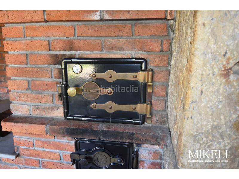 Foto ab9c892f-a870-45e8-8e01-d6925ef9da1d. Chalet  unifamiliar con jardín y parcela urbana para construir . en Liérganes