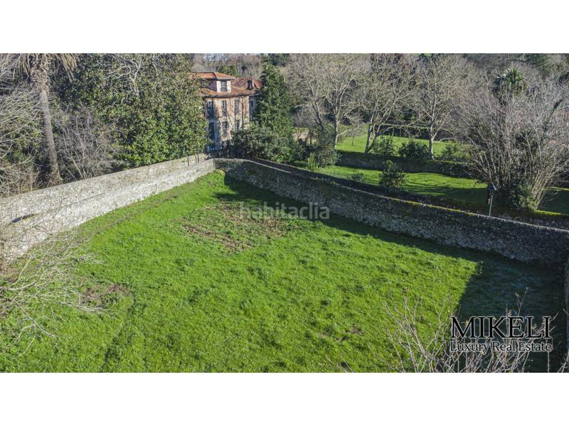 Foto d9a9ec1e-1026-454b-b8f5-0ef42ff9cb48. Chalet  unifamiliar con jardín y parcela urbana para construir . en Liérganes