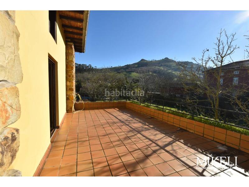 Foto e715b4bf-be9b-4aaf-9396-aa3131ad4e03. Chalet  unifamiliar con jardín y parcela urbana para construir . en Liérganes