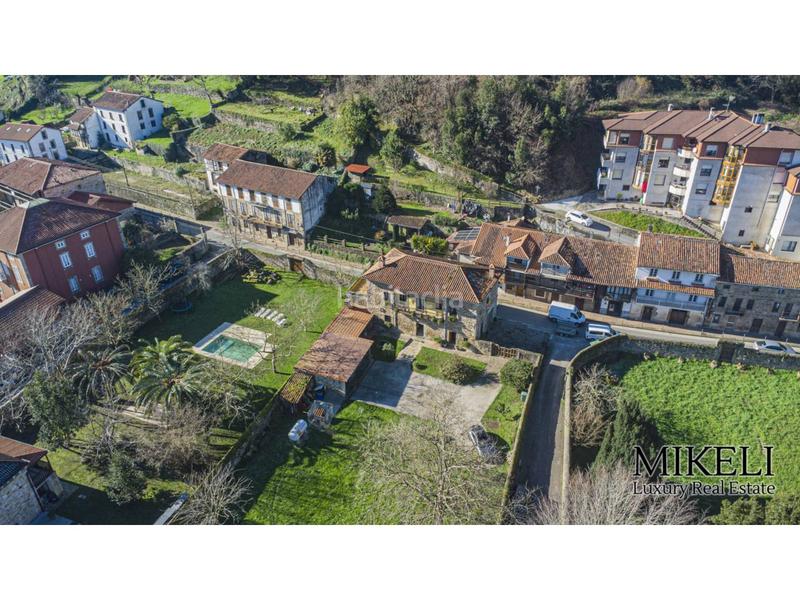 Foto edf8eed4-f002-4d6b-b460-b6627c140b89. Chalet  unifamiliar con jardín y parcela urbana para construir . en Liérganes