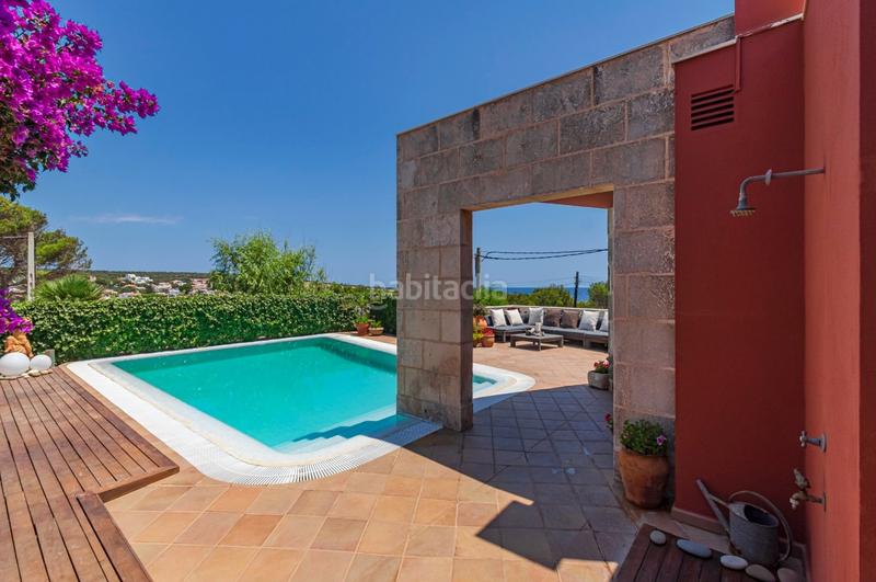 Foto 1a6c5305-3cd4-4876-8fc1-3d981dc4858c. Chalet fantastica villa con vista al mar en punta prima en Sant Lluís