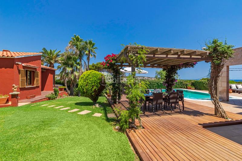 Foto 3789bd5e-26d1-4f10-ae6e-676d0d118e4a. Chalet fantastica villa con vista al mar en punta prima en Sant Lluís